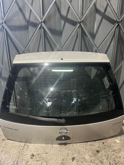 Tampa da mala Opel Corsa C 2004