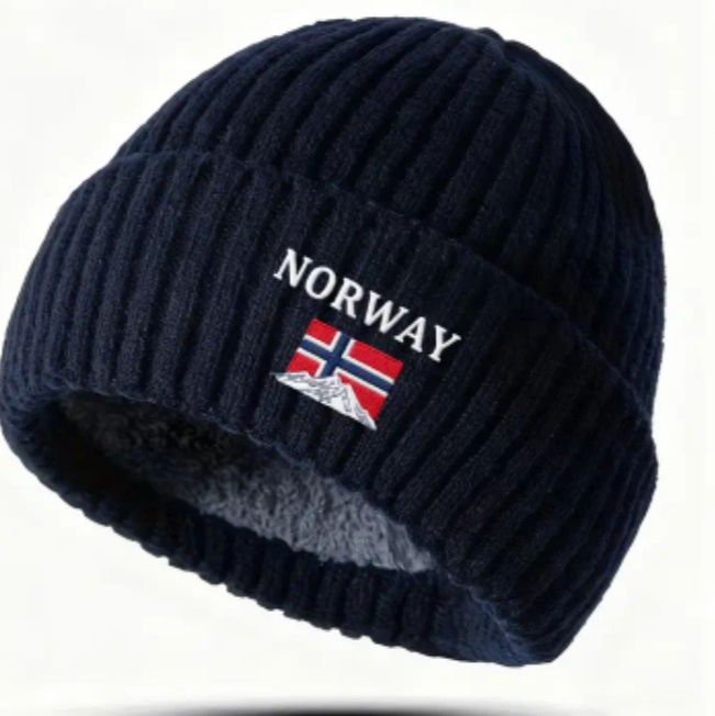 Теплі чоловічі шапки на хутрі та комплекти