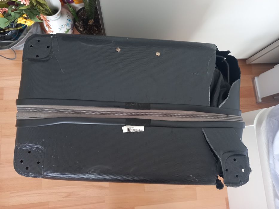 Mala Viagem Grande com defeito.