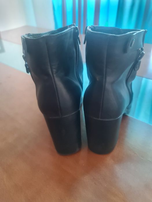 Botas pretas como novas