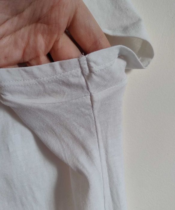 Біла футболка LOGG від H&M