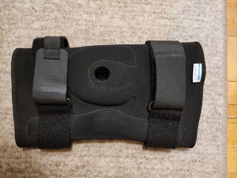 Фіксатор на коліно колінну чашечку