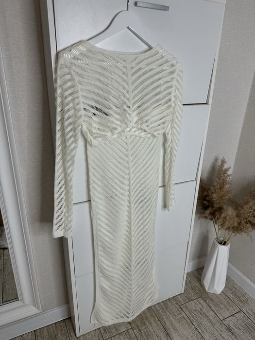 Вязаний косюм білого кольору