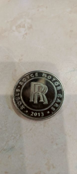 Монета Rolls Roys