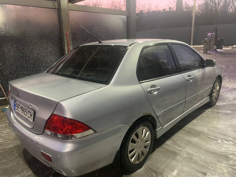 Лансер 1,6 бензин