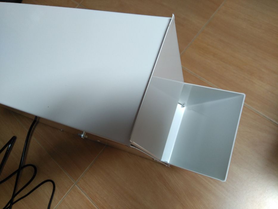 Maquina de limpar sementes de passaros ou para polen.