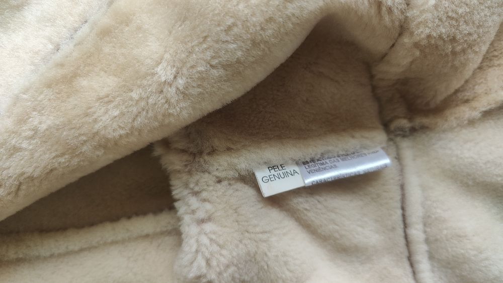 Casaco de pele genuína