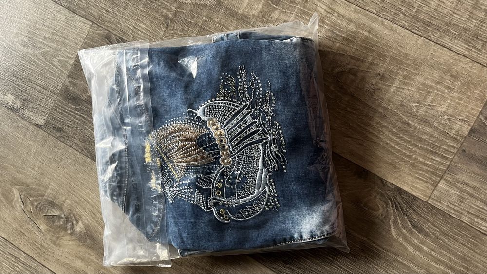 Джинсовка, жіноча джинсова куртка