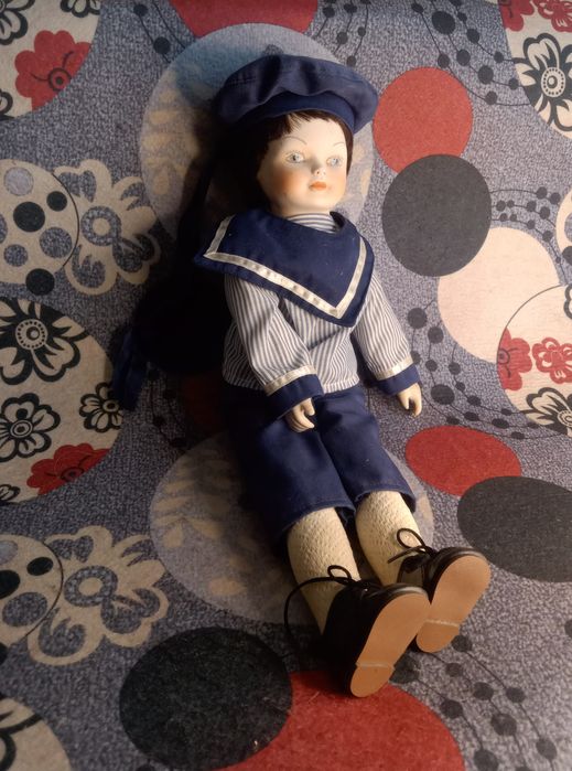 Lalka porcelanowa marynarz