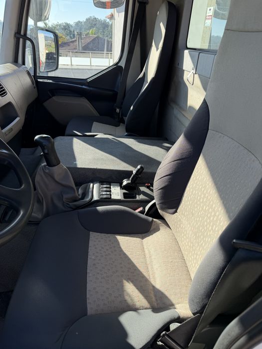 Renault kerax com ampiroll e grua