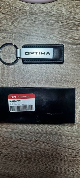Продам брелок на ключи KIA UQ016AY744