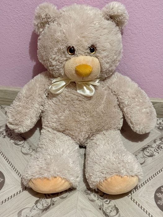 Ведмедик Мʼяка іграшка фірма «Левеня» бежевого кольору з бантом