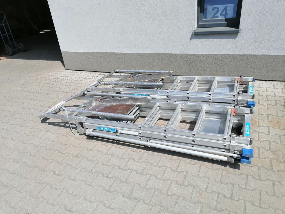 Drabina aluminiowa Zagres, podest roboczy, zasięg roboczy do 3,8m.