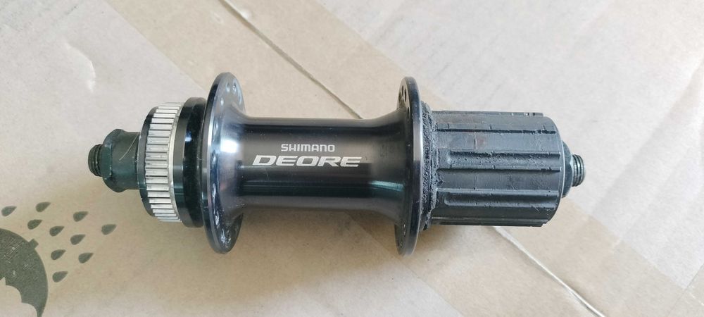 Piasta tylna na tył Shimano DEORE na 32 szprych