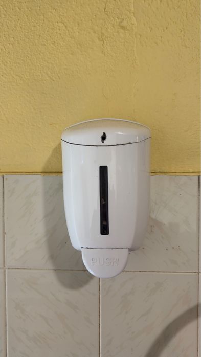 Dispensador de desinfetante e dispensador de papel