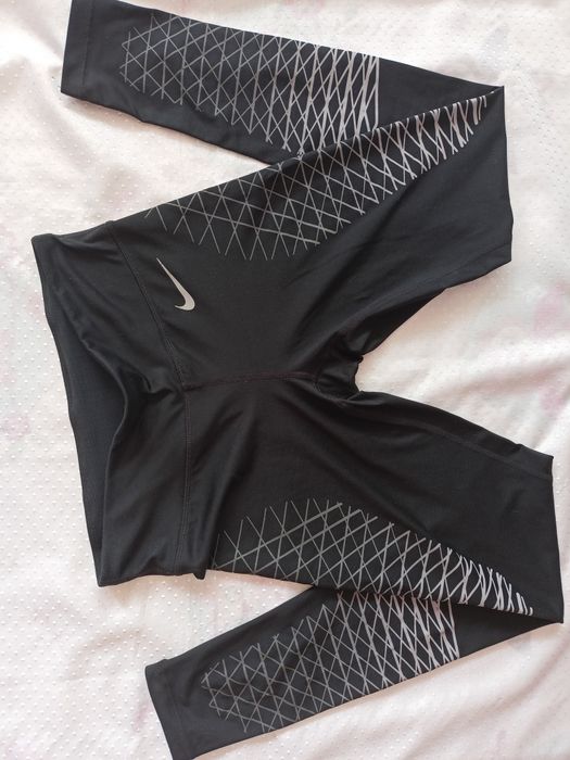 Nike spodnie sportowe  biegowe damskie