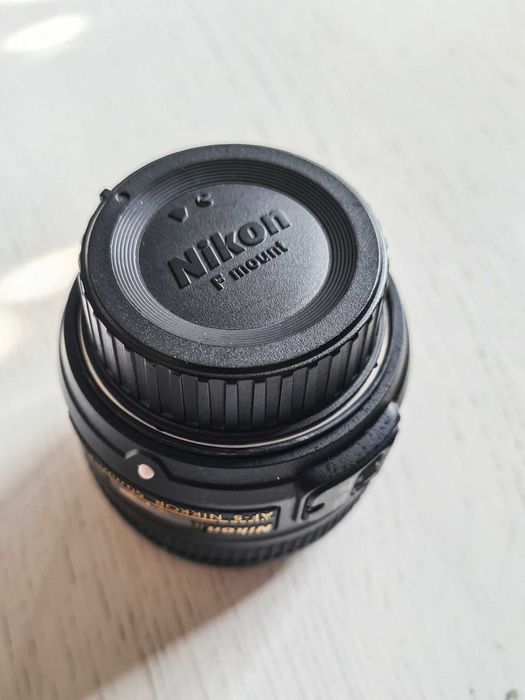 Obiektyw Nikon AF-S Nikkor 50mm f/1.8G – pudełko, dokumenty, 2 dekielki.