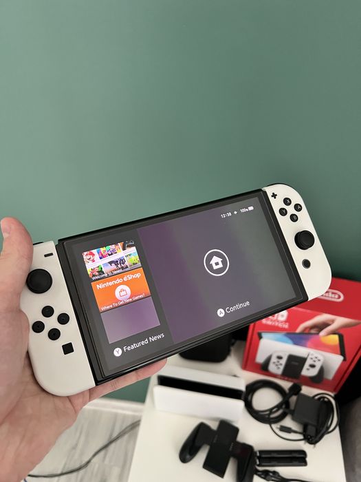 Nintendo Switch Oled 64gb + karta 128gb