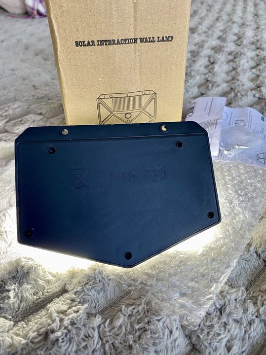 Ліхтар 100 LED на сонячній батареї з датчиком рухуЛампаБлекаут