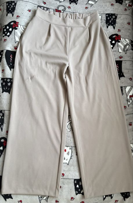 Nowe spodnie damskie beżowe L