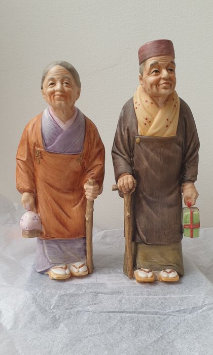 Casal de estatuetas de cerâmica