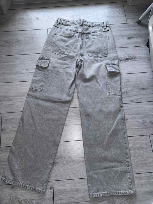 Spodnie jeansowe jeansy damskie jasnoszare Cropp