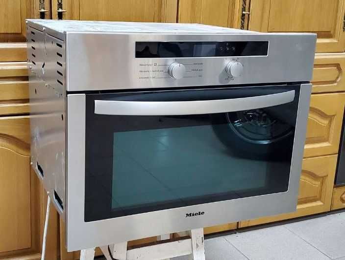 Продам духовой шкаф Miele H 4010 BM с функцией микроволновки.