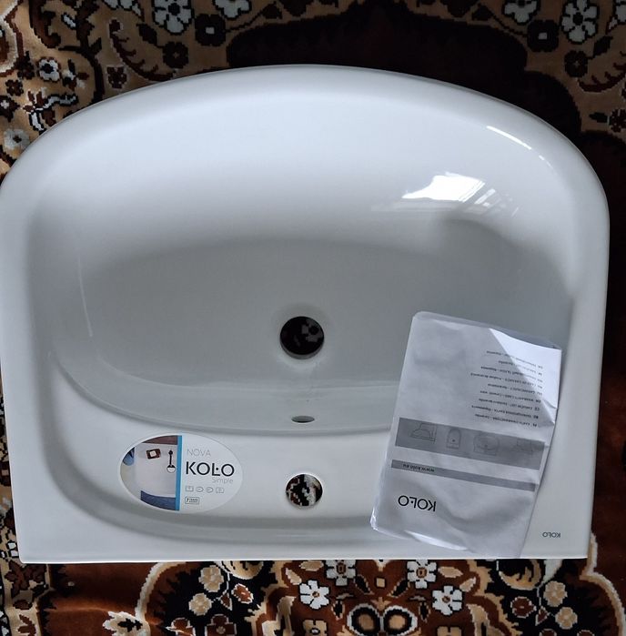 Керамічний умивальник серії KOLO