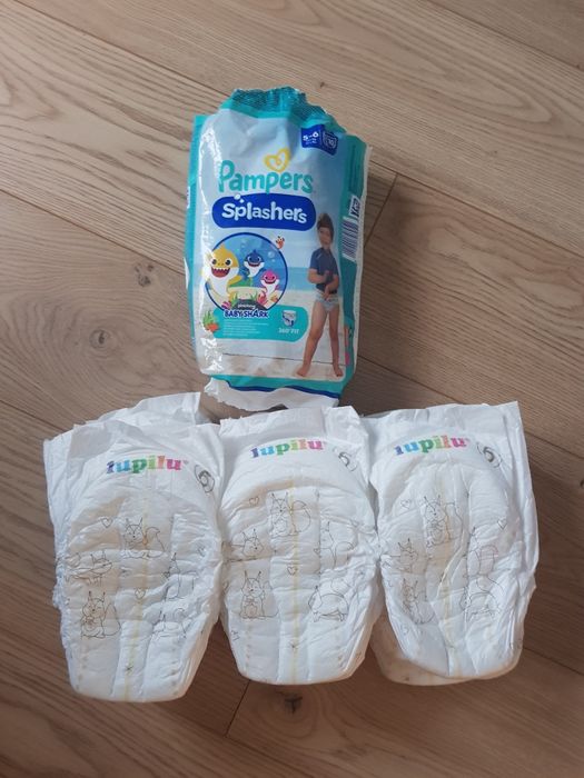 Pieluchy lupilu 6 18 sztuk + 5 sztuk Pampers do wody