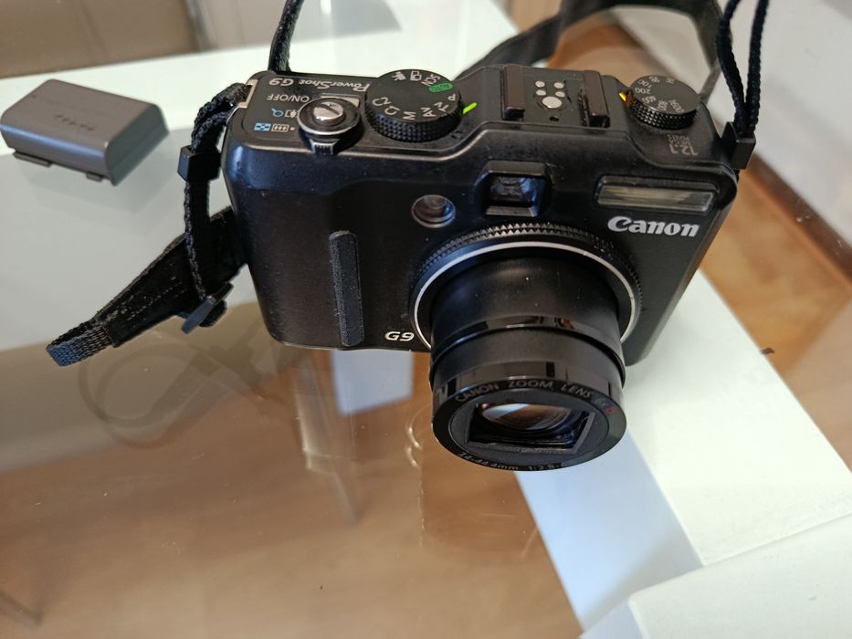 Canon G9 completa, carregador e 2 baterias, precisa limpar obturador ou para peças.