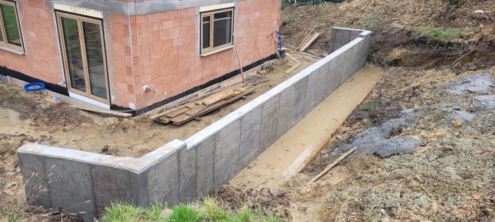 Mury oporowe mur oporowy fundamenty płyty fundamentowe garaże podziemn