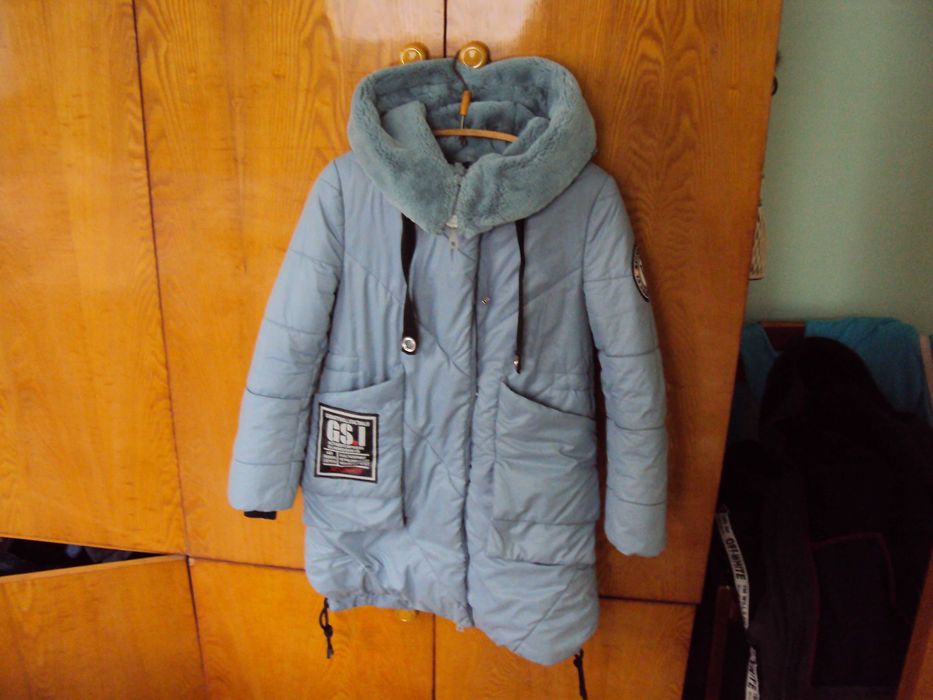 Зимові курточки на дівчинку 140 розмір