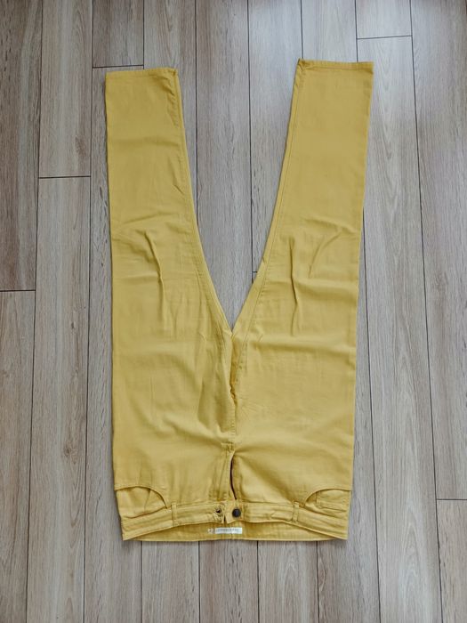 Spodnie damskie żółte. 44 XXL