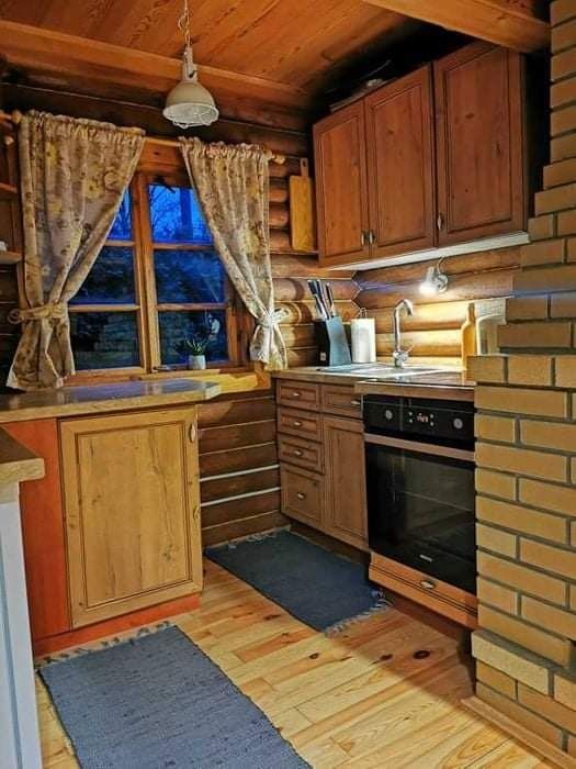 Domek nad Jeziorem Piaseczno Chata Soła, kominek taras