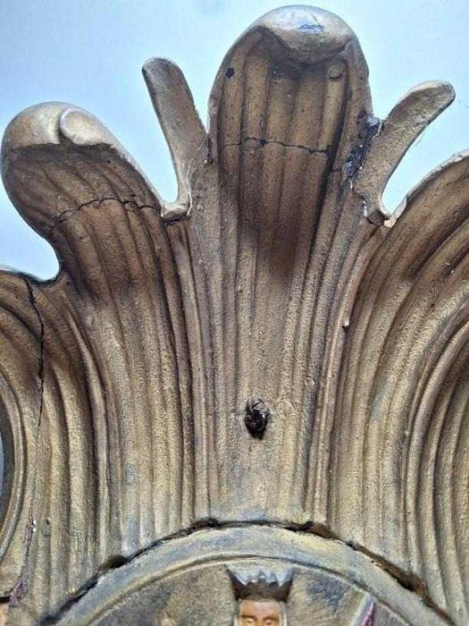 Stary drewniany herb