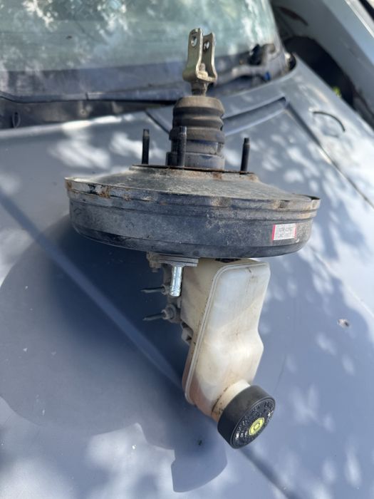 Вакуумный усилитель тормозов в сборе Toyota Yaris 1,3 1999-2004г.
