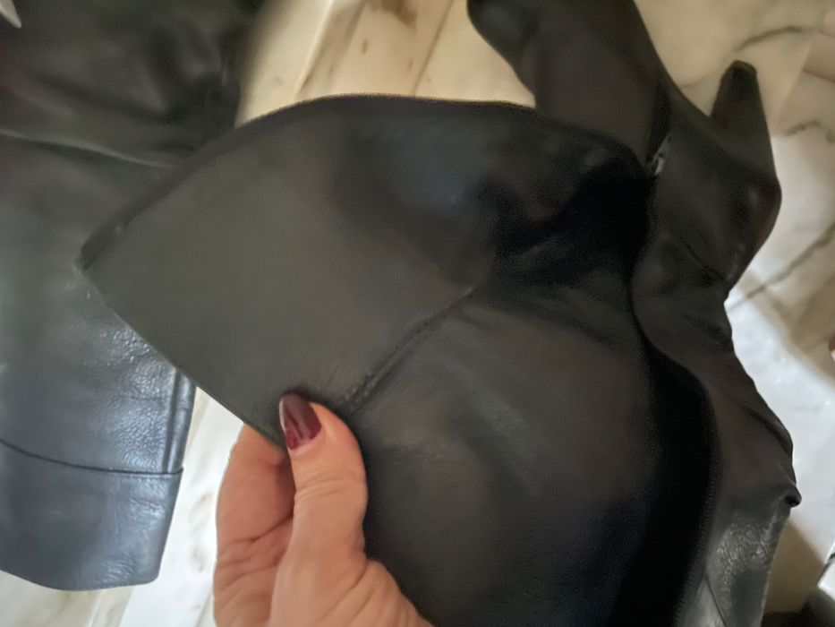 Botas de cano alto em pele pretas