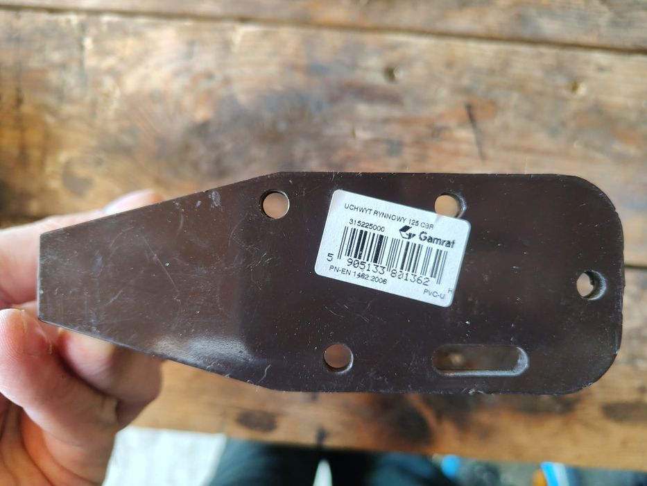 Uchwyt rynny hak Marley 125 mm brązowy SZT