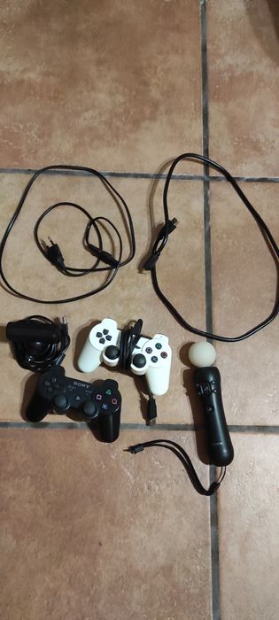 PS3 + Comando (2) + Comando MOVE(1) + Câmara (1)+ Jogos (13)
