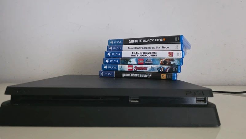 PlayStation 4 Slim 1TB com 2 Comandos e 6 Jogos