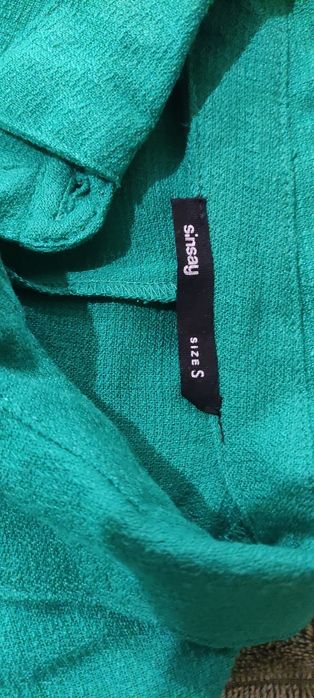 Нова ізумрудна сукня