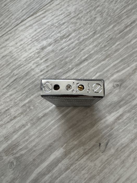 зажигалка с фирменым щелчком