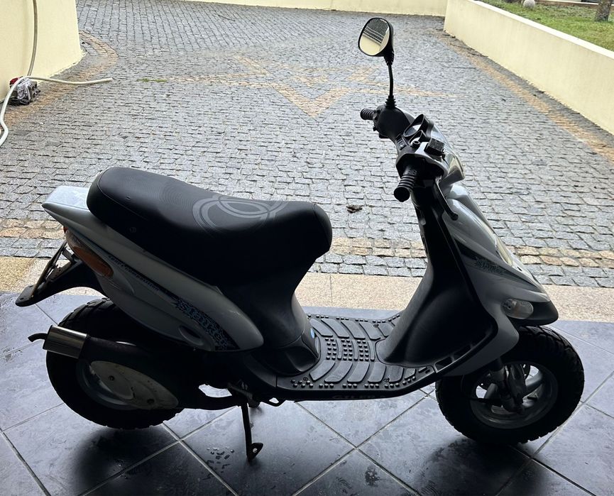Scooter, capacete e Luvas