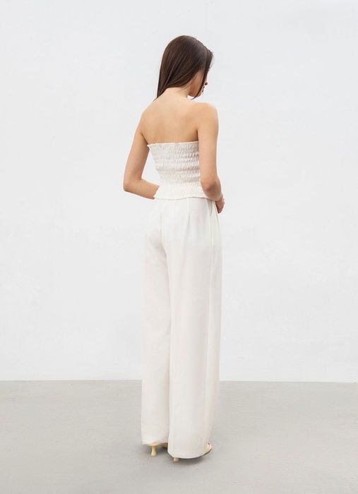 Білі штани палаццо