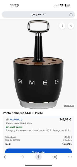 talheres smeg novo na caixa preto.