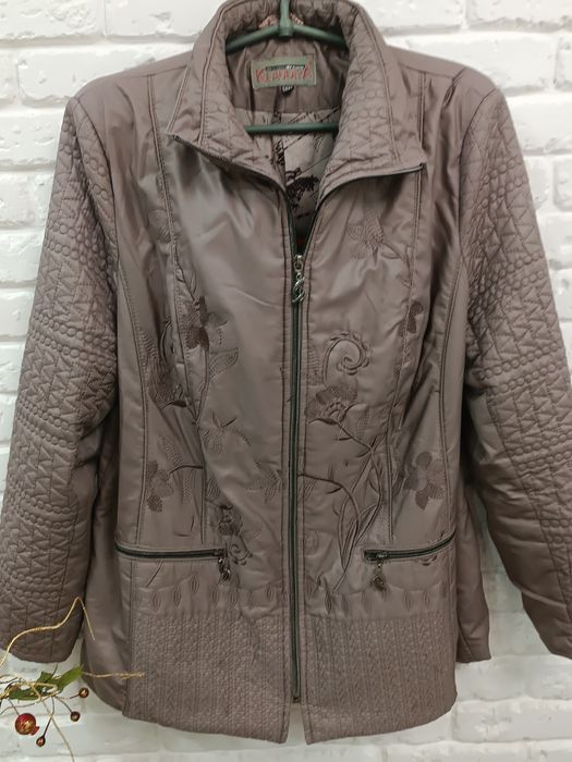 Жіноча куртка р 54