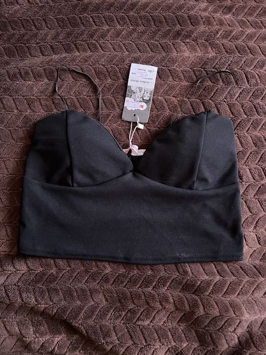 Топ новий не підійшов розмір