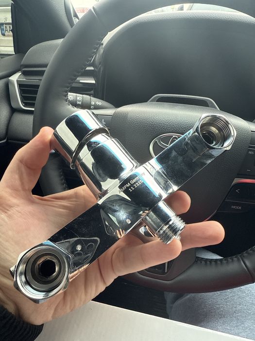 Кран-змішувач в ванну