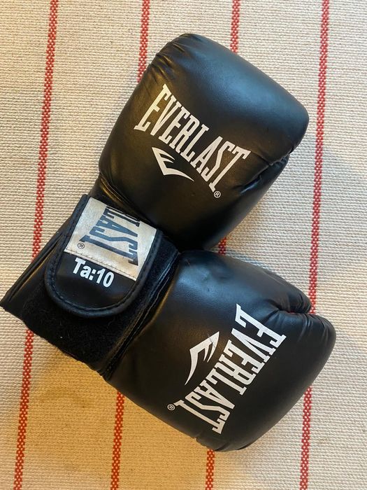 Luvas de boxe e Muay thai