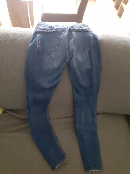 Calças de ganga rasgadas